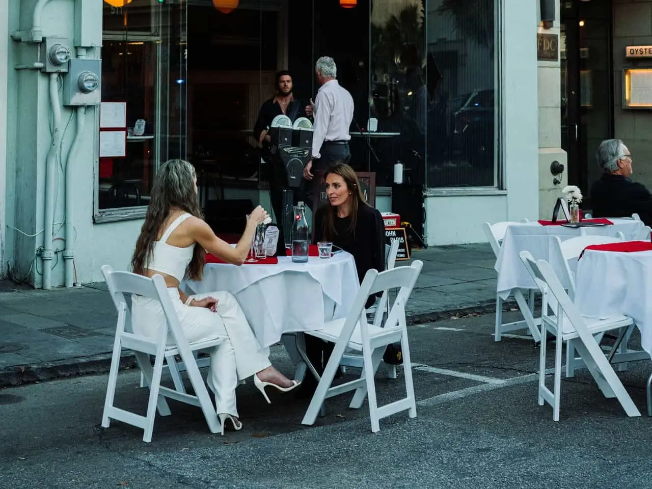 People eating at a restaurant outdoors