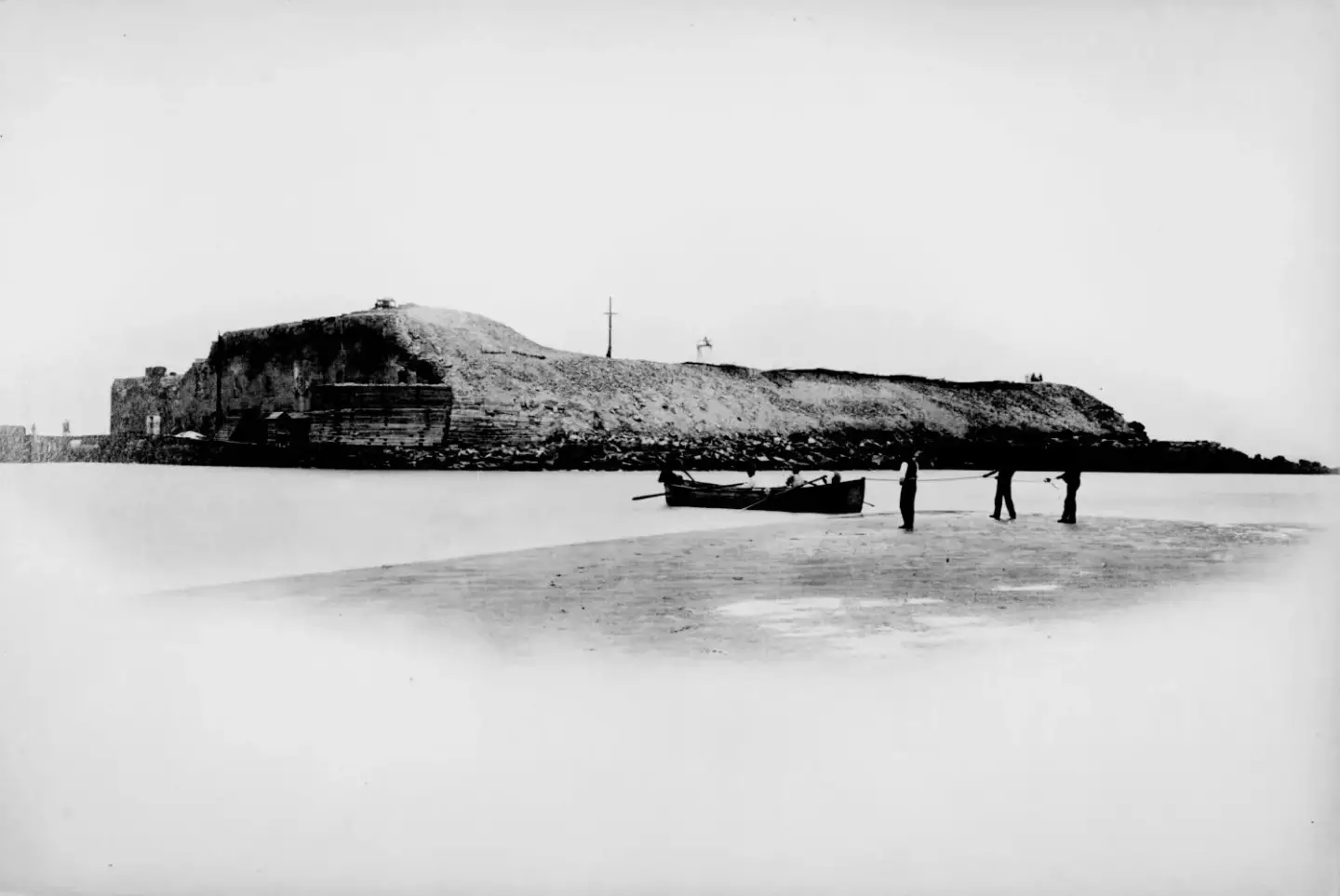 black and white photograph of a shipwreck in fort sumter