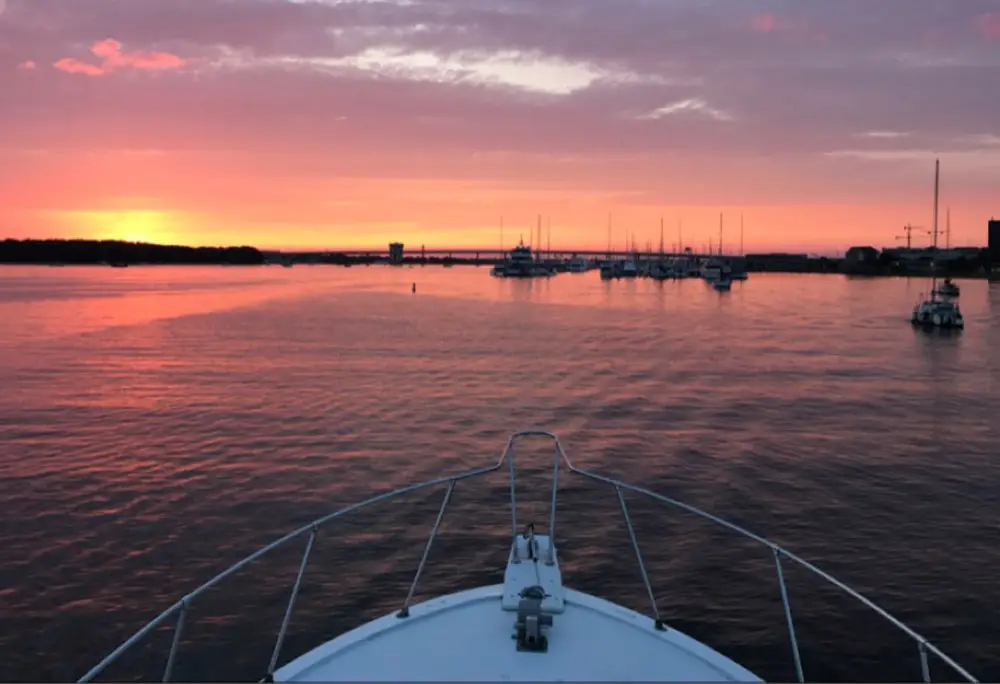 looking off the bow at a beautiful Charleston SC sunset