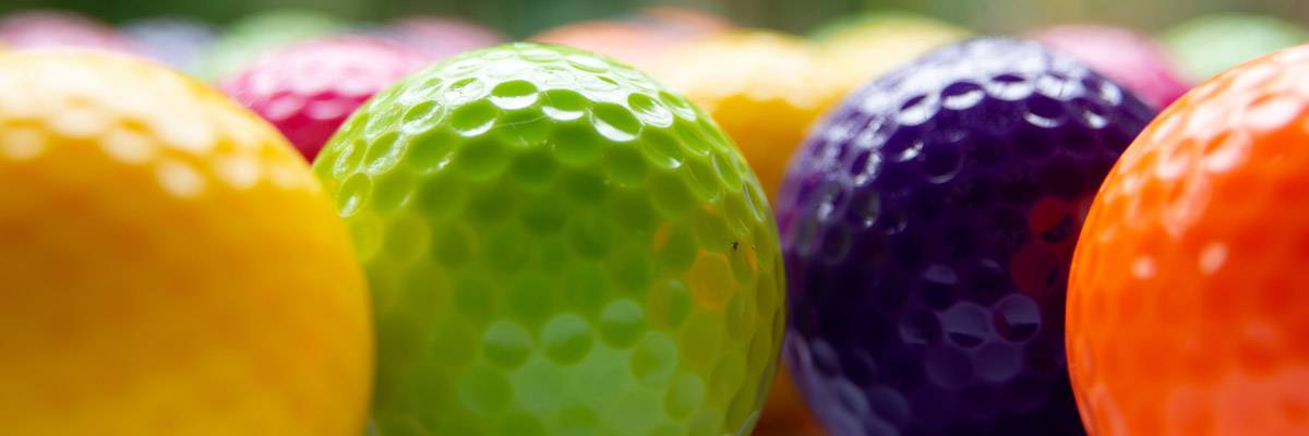 Close up of colorful golf balls