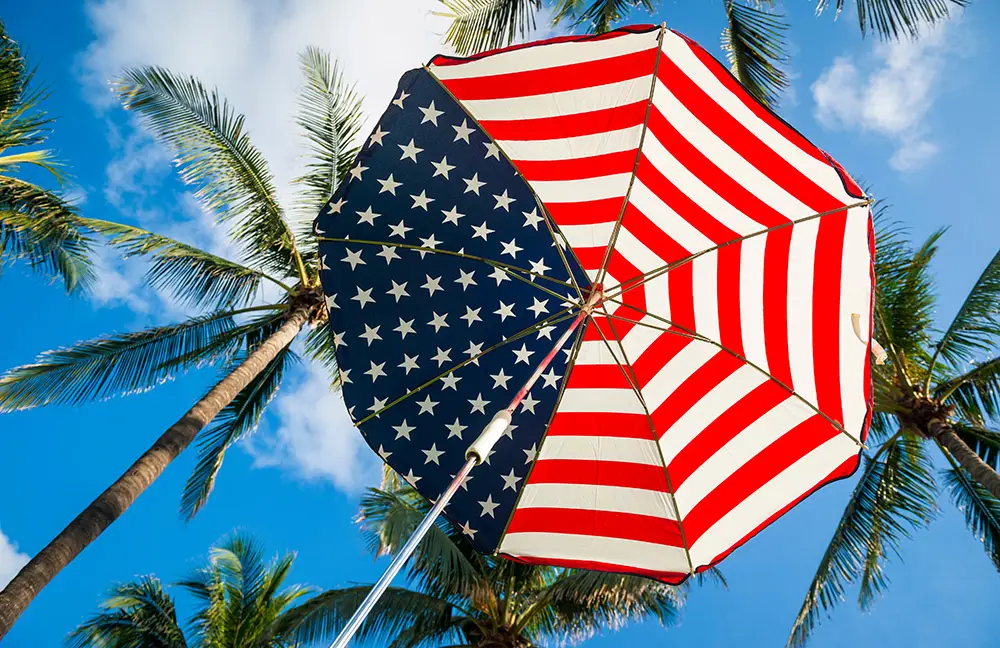 American Flag Beach Umberella with palm trees