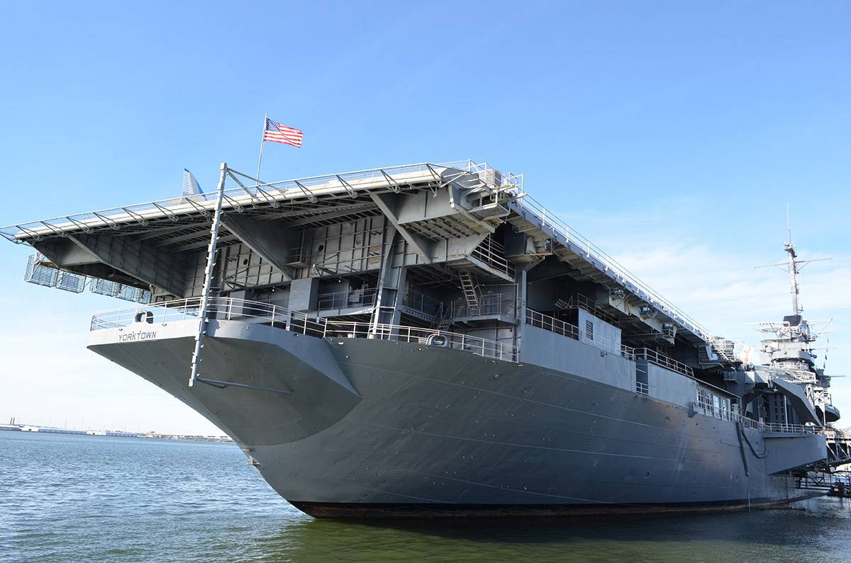 USS Yorktown with American Flag