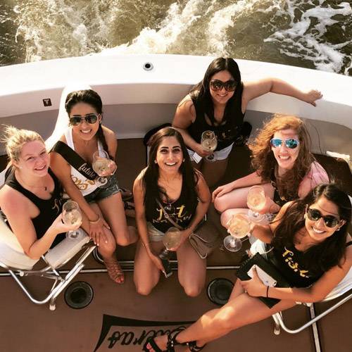 Girls Having Drinks On Boat